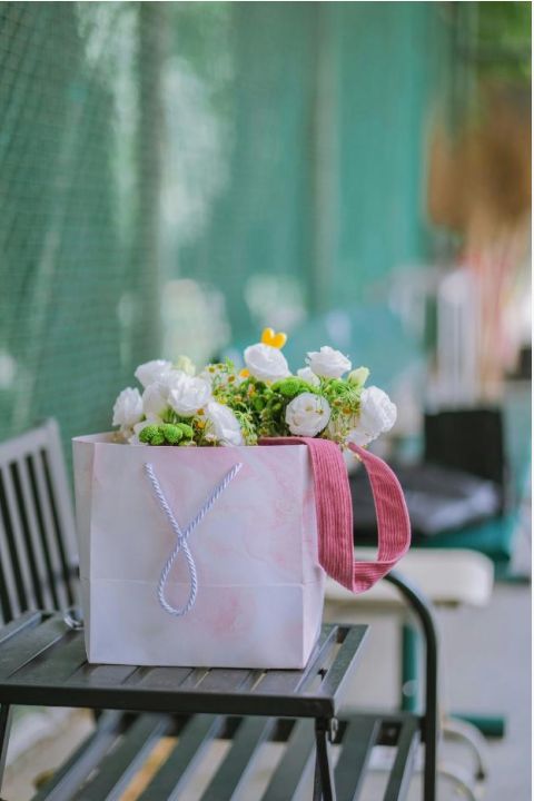 Fresh seasonal bouquet on table