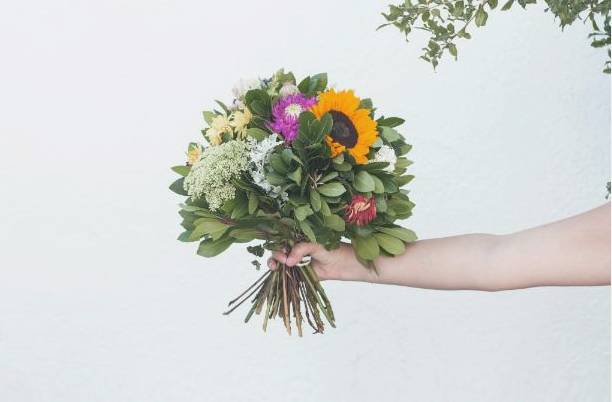 Students arranging bouquets